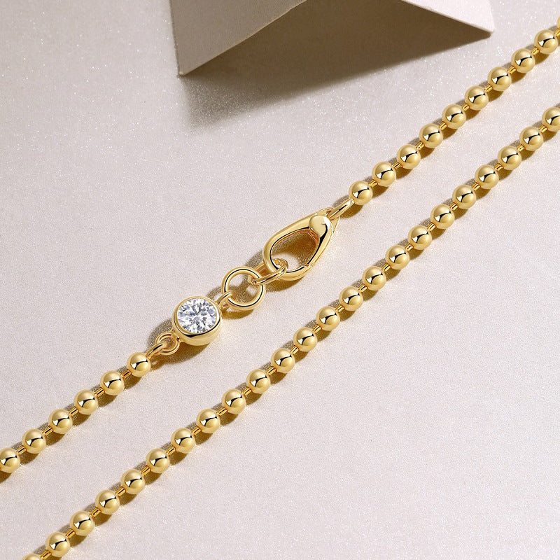 High-definition shot of the necklace laid flat on pure white.