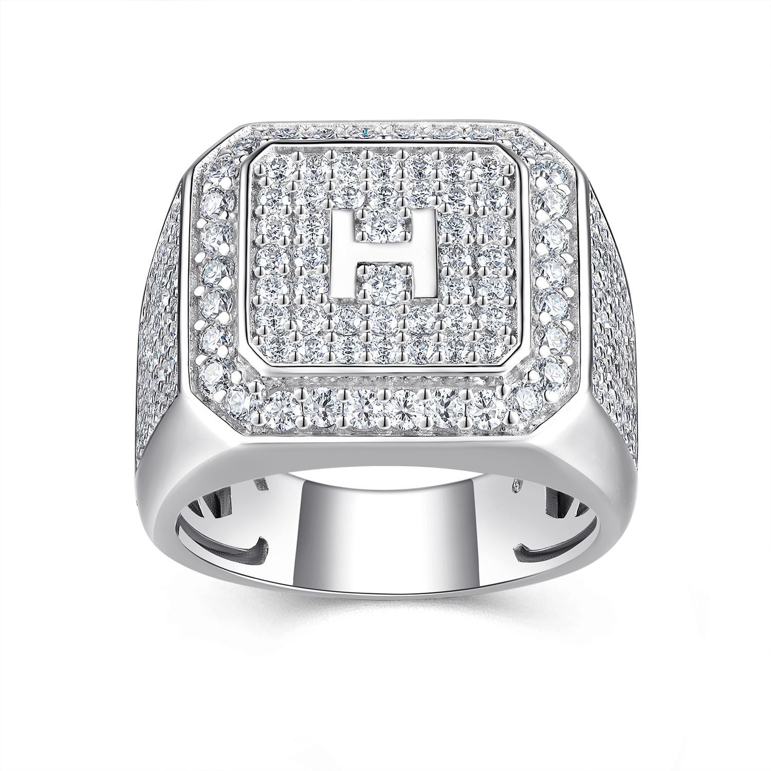 Silver ring with 'H' emblem on a white background
