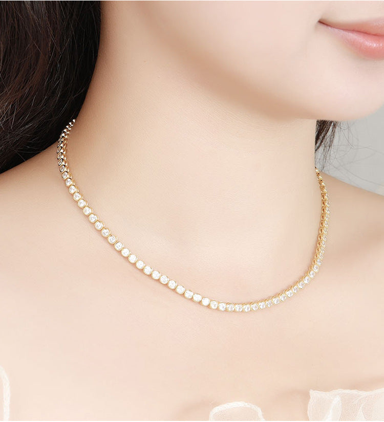 Female Model: Model wearing the necklace on bare skin or with an outfit.