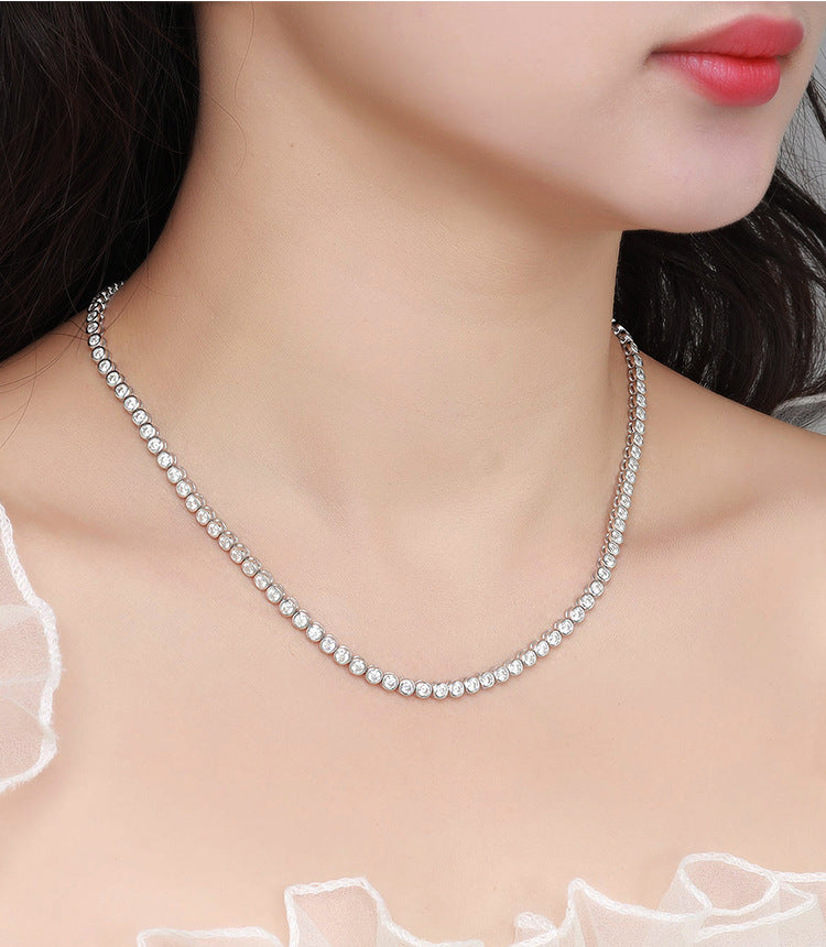 Female Model: Model wearing the necklace on bare skin or with an outfit.
