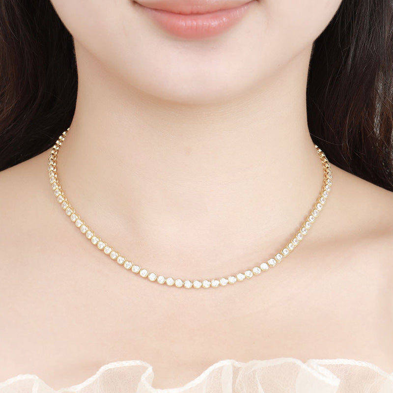Female Model: Model wearing the necklace on bare skin or with an outfit.