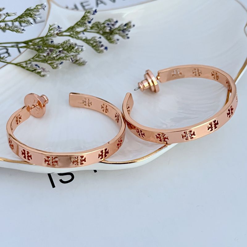 Styled in a modern, minimalist setting—like a concrete studio or urban loft—to complement their architectural design.