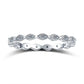 Silver ring with wavy design and embedded diamonds on a white background