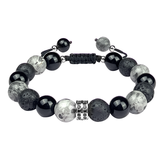 Bracelet with black, gray, and white beads on a white background