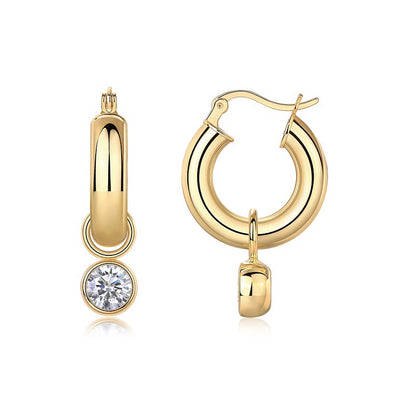 Gold moissanite studs on neutral background. Alt: “One-Carat Moissanite Stud Earrings – 18K Gold Plated.”