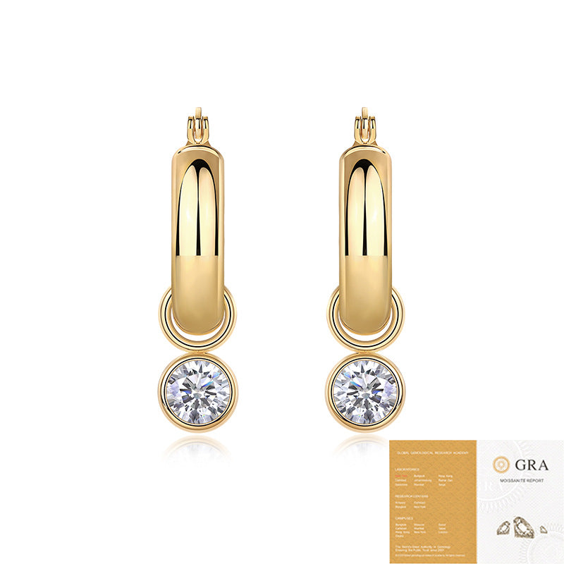 Gold moissanite studs on neutral background. Alt: “One-Carat Moissanite Stud Earrings – 18K Gold Plated.”