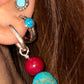 “Turquoise cinnabar silver earrings lifestyle shot”