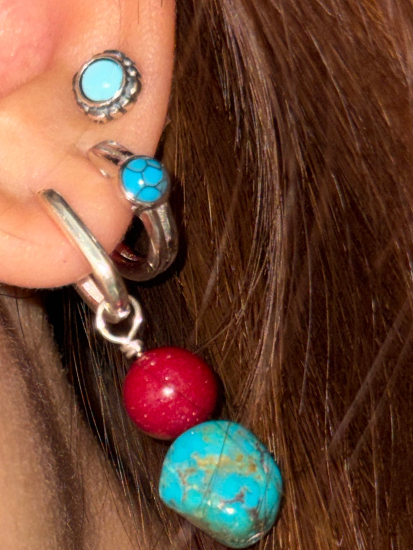 “Turquoise cinnabar silver earrings lifestyle shot”