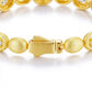 Full bracelet in horizontal layout, slightly curved, white background, even stones, minimal luxury style.