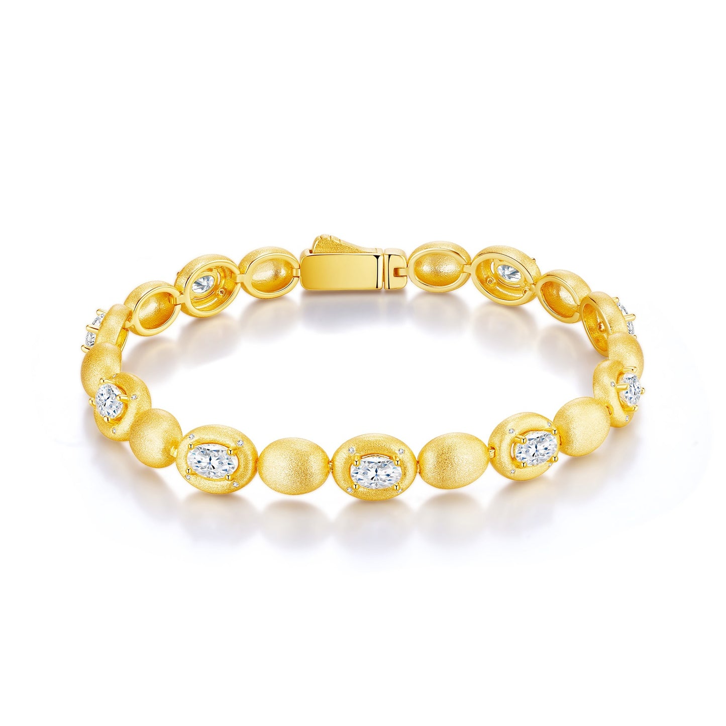 Clean white background — the oval beaded moissanite bracelet laid flat on a neutral surface or displayed on a wrist form. The oval moissanites catch light, showcasing brilliant cut sparkle, while polished beads add soft texture and balance.