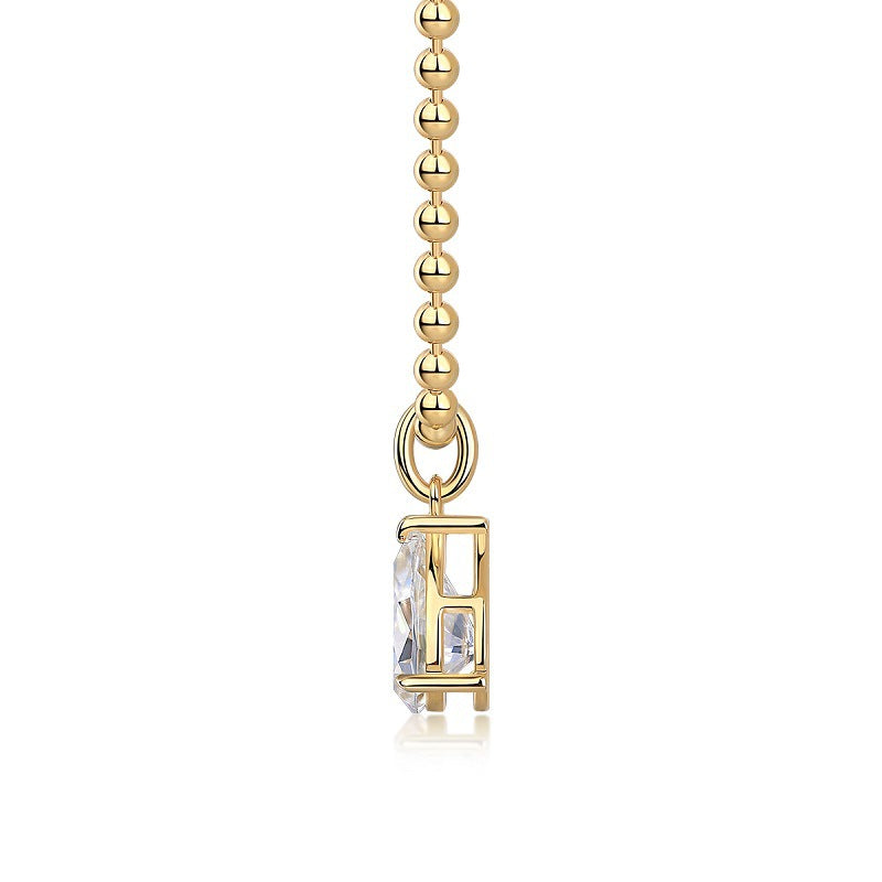 High-definition shot of the necklace laid flat on pure white.