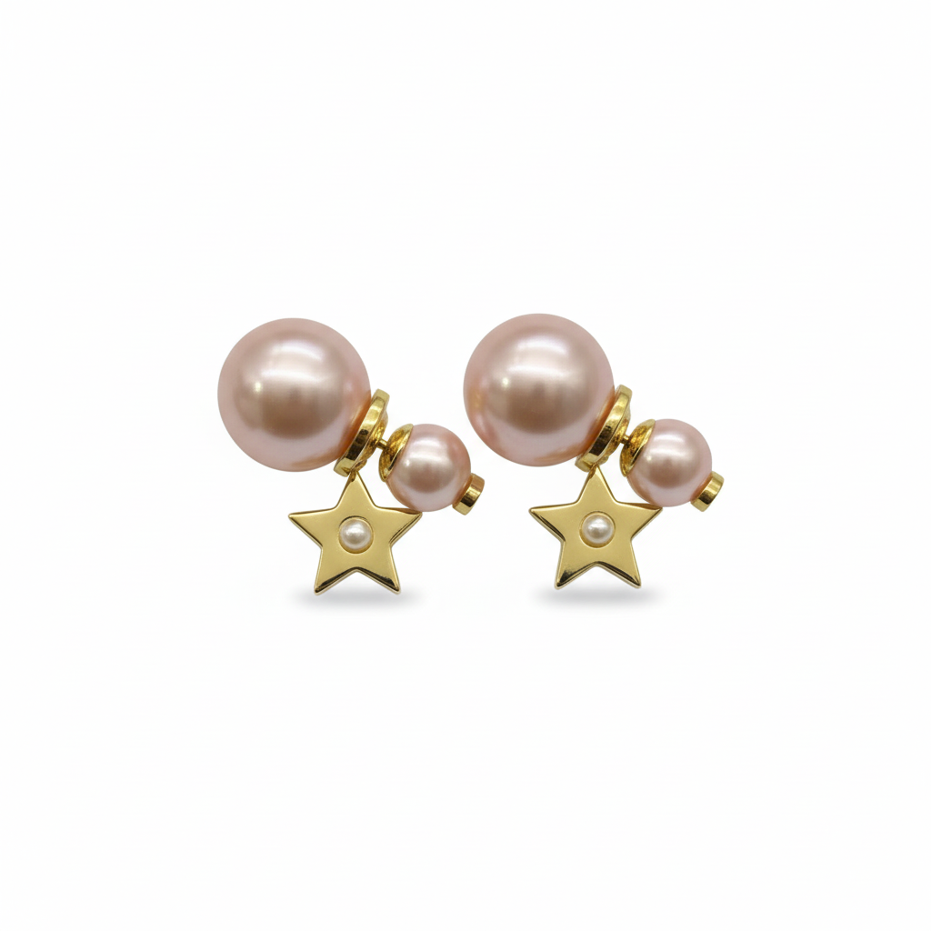 Pearl earrings Dior Gold in PearlPair of pearl earrings with gold star charms on a white background