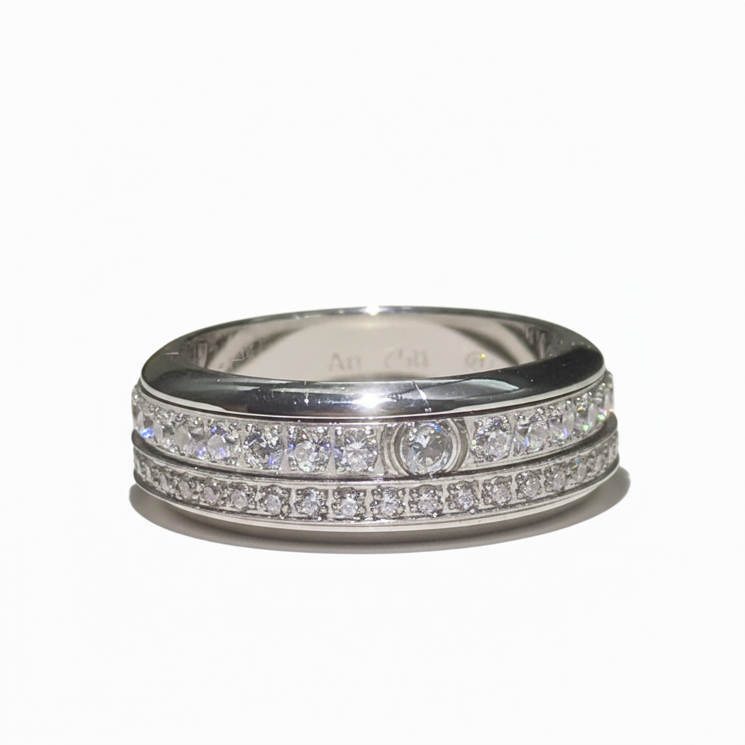 Piaget Possession “Fortune Flow” Spinning Ring | 925 Sterling Silver Paved Zircon Silver ring with diamond accents on a white background