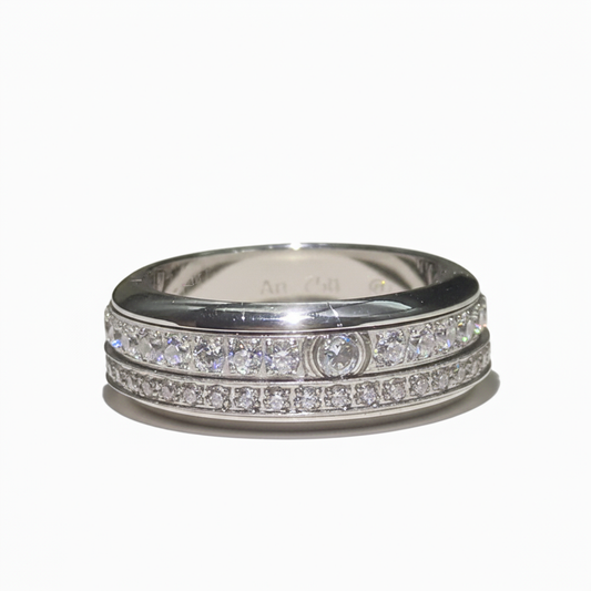 Piaget Possession “Fortune Flow” Spinning Ring | 925 Sterling Silver Paved Zircon Silver ring with diamond accents on a white background