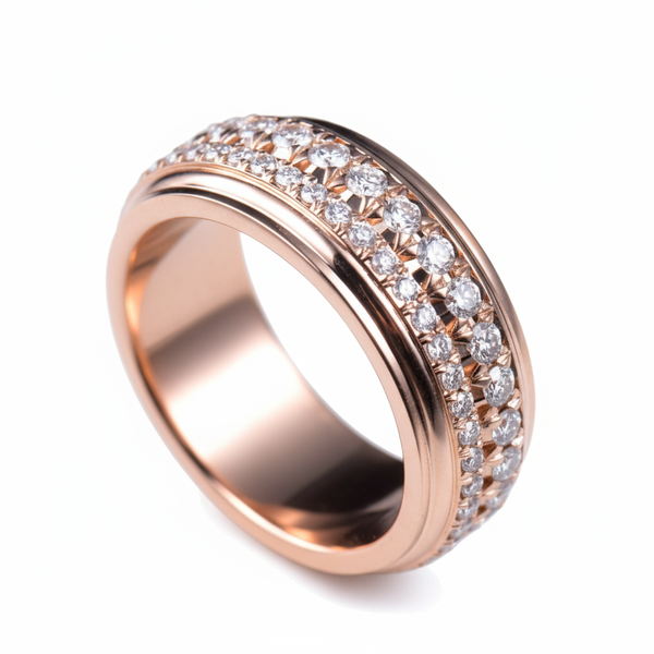 Piaget Possession “Fortune Flow” Spinning Ring | 925 Sterling Silver Paved Zircon Rose gold ring with diamond accents on a white background