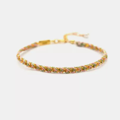 Bracelet with braided design on a white background