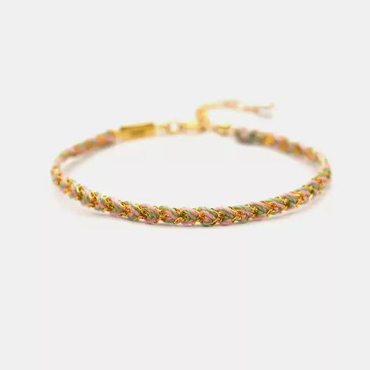 Bracelet with braided design on a white background