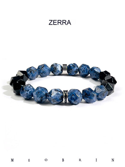 Blue beaded bracelet with black accents on a white background, featuring the brand 'Zerra'.