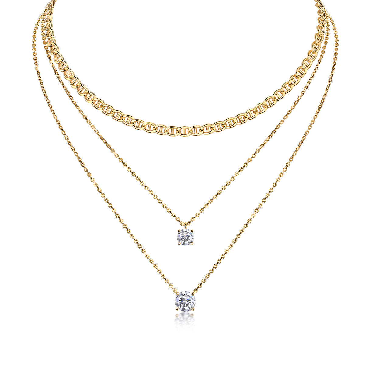 Clean white background — the round moissanite solitaire pendant layered with 2-3 mixed chains on a bust form. The round brilliant cut catches light from every angle, showcasing signature sparkle and fire. Chains vary in texture for balanced visual interest.
