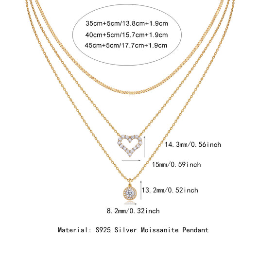 Clean white background — the round moissanite solitaire and heart pavé pendant, each on its own chain, layered elegantly on a bust form. The round solitaire catches bright light with classic brilliant sparkle, while the pavé heart glitters with micro-stone fire.