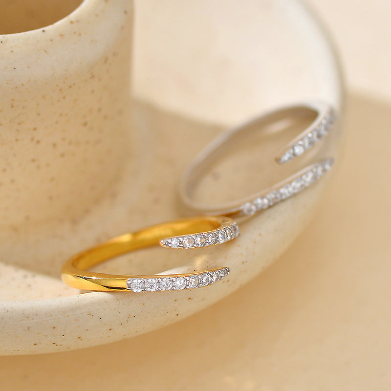 “Close-up of micro-paved zircon design on sterling silver adjustable ring”