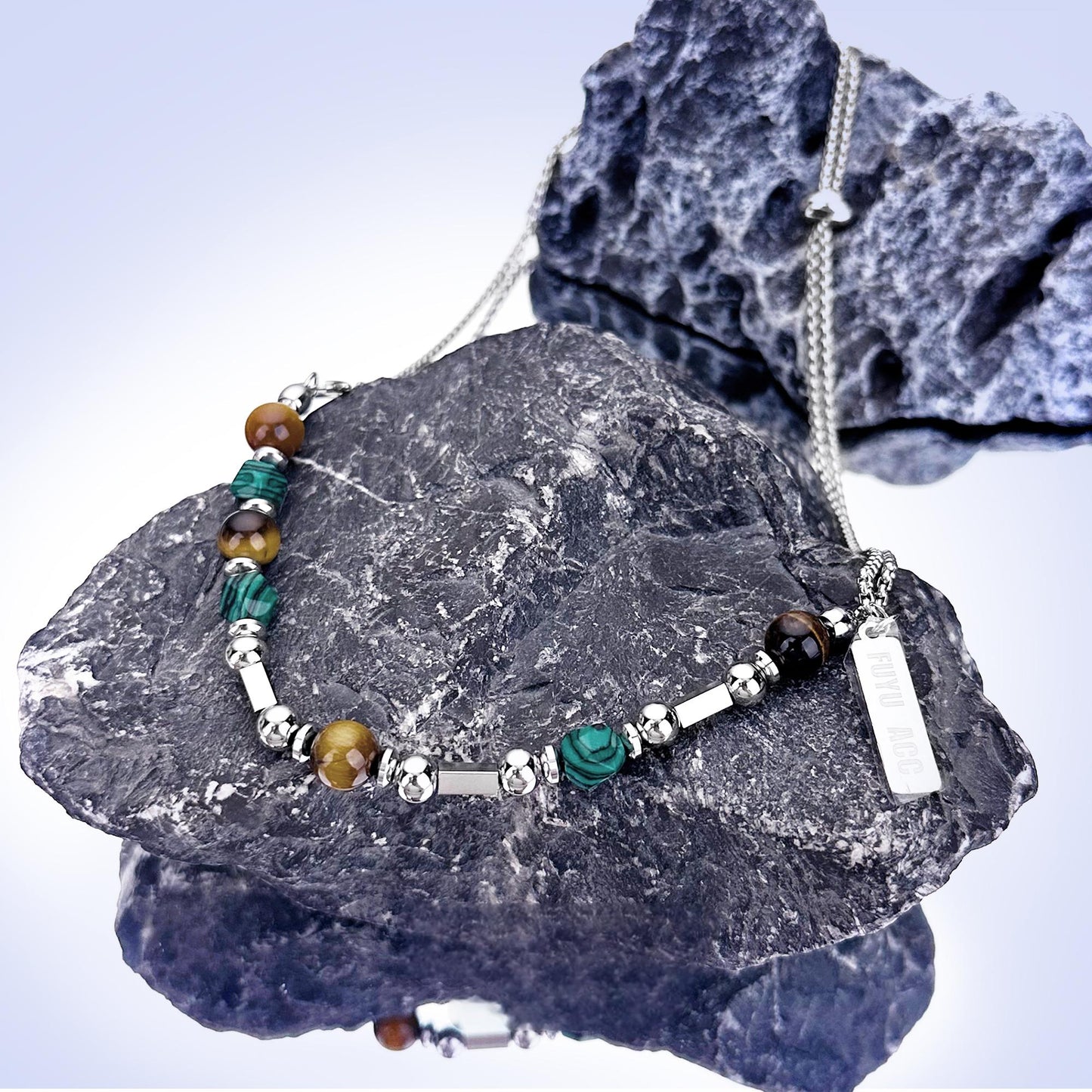 Close-up detail of sterling silver beads and chain fusion structure”