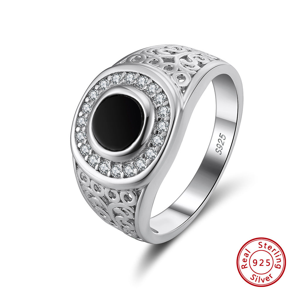 “Turkish black onyx men’s ring flat lay on textured surface”