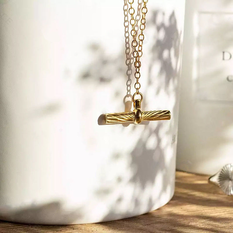 Close-up of Geometric Cylinder Pendant and Fine Silver Chain