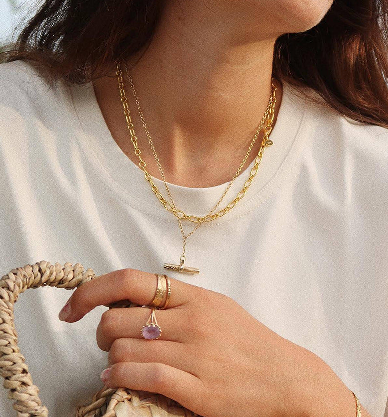 Woman Wearing Minimalist Cylinder Silver Necklace
