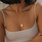 Woman Wearing Minimalist Cylinder Silver Necklace