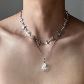 "Minimalist cold-tone silver bird necklace for men and women"