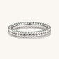 “Flat lay of S925 sterling silver double beaded ring minimalist style jewelry”