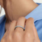 “Woman wearing elegant minimalist silver beaded ring in INS fashion style”