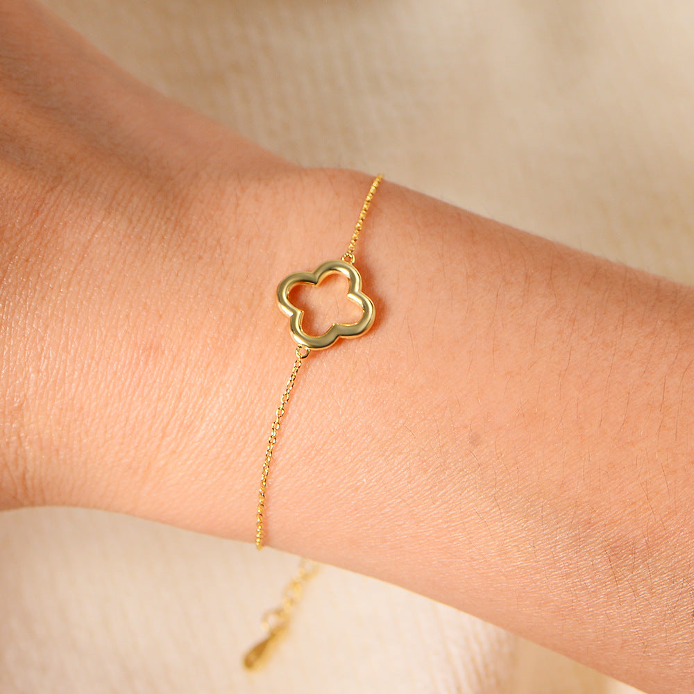 Woman Wearing Minimalist Silver Clover Bracelet in INS Style