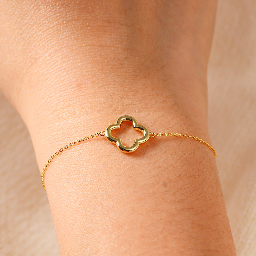 Woman Wearing Minimalist Silver Clover Bracelet in INS Style