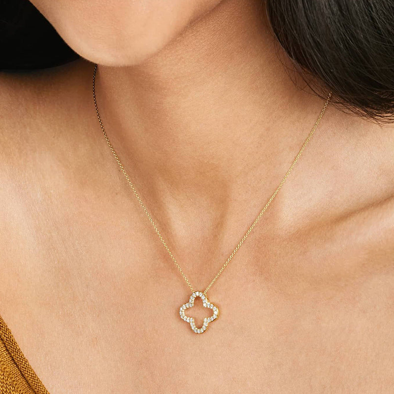 Woman Wearing Minimalist Silver Four Leaf Clover Necklace