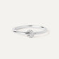 “Flat lay of S925 sterling silver pavé circle ring with dainty lock design”