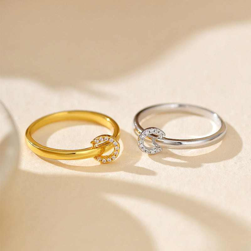 “Close-up of micro-paved cubic zirconia full circle motif on sterling silver ring”