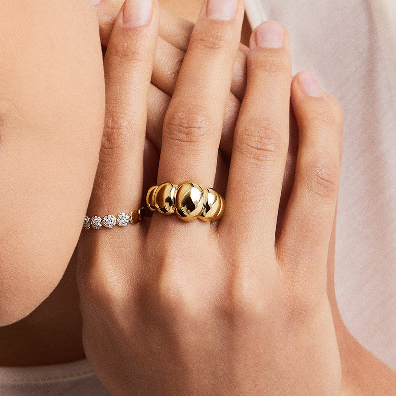 “Model wearing bold geometric dome ring in sterling silver”