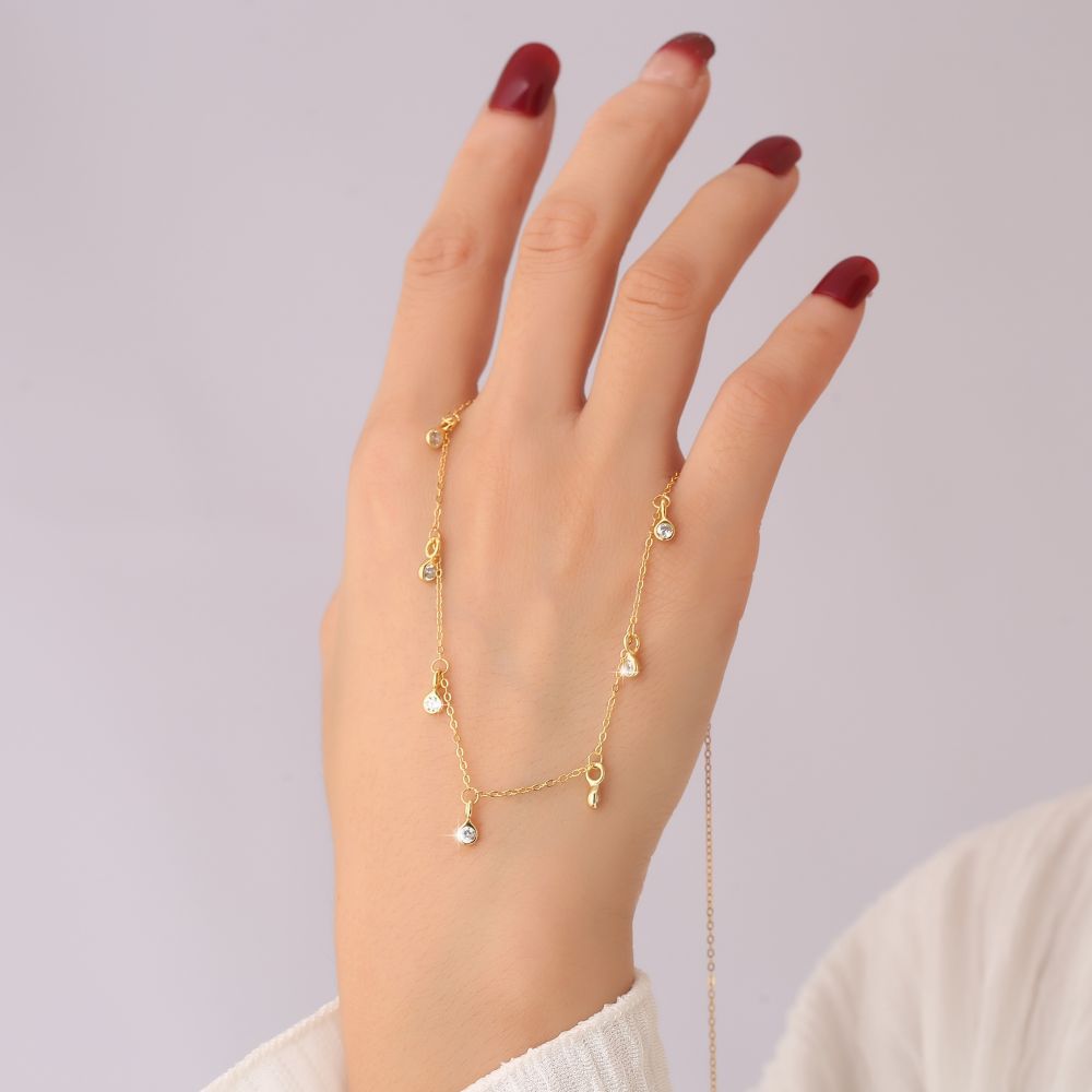 “Close-up of pavé set cubic zirconia teardrop pendant”