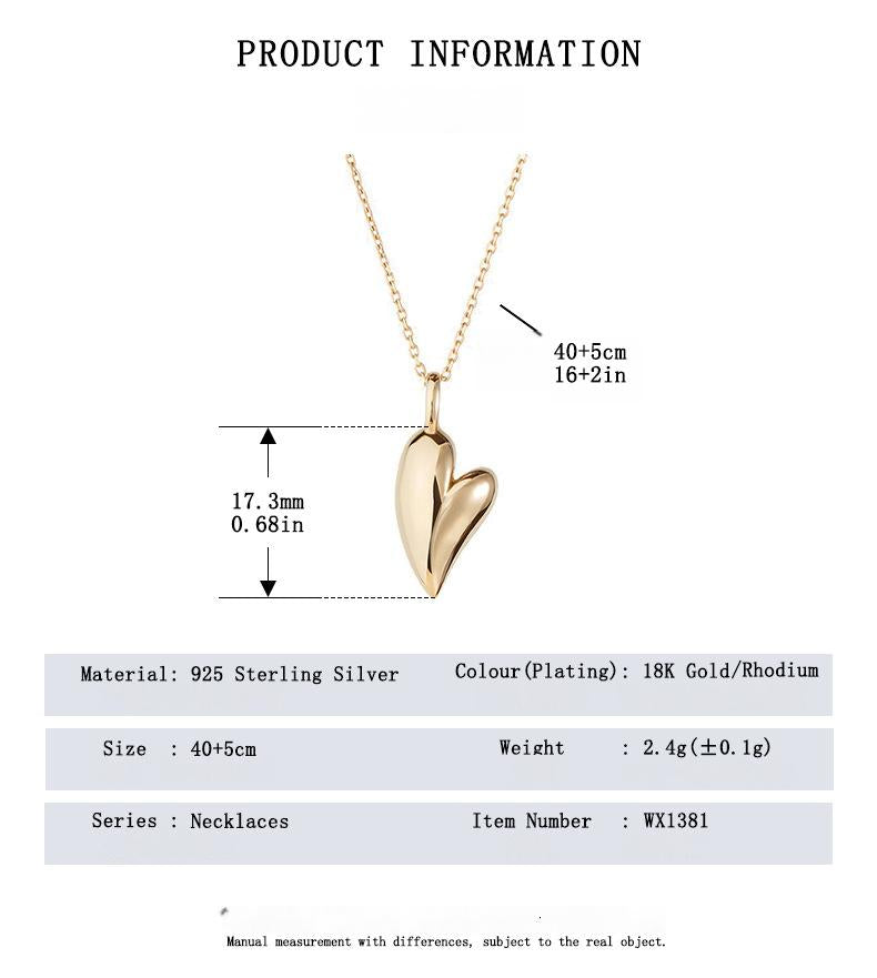 “Elegant minimalist silver jewelry styled with casual outfit”Gold heart-shaped necklace with measurement details on a white background