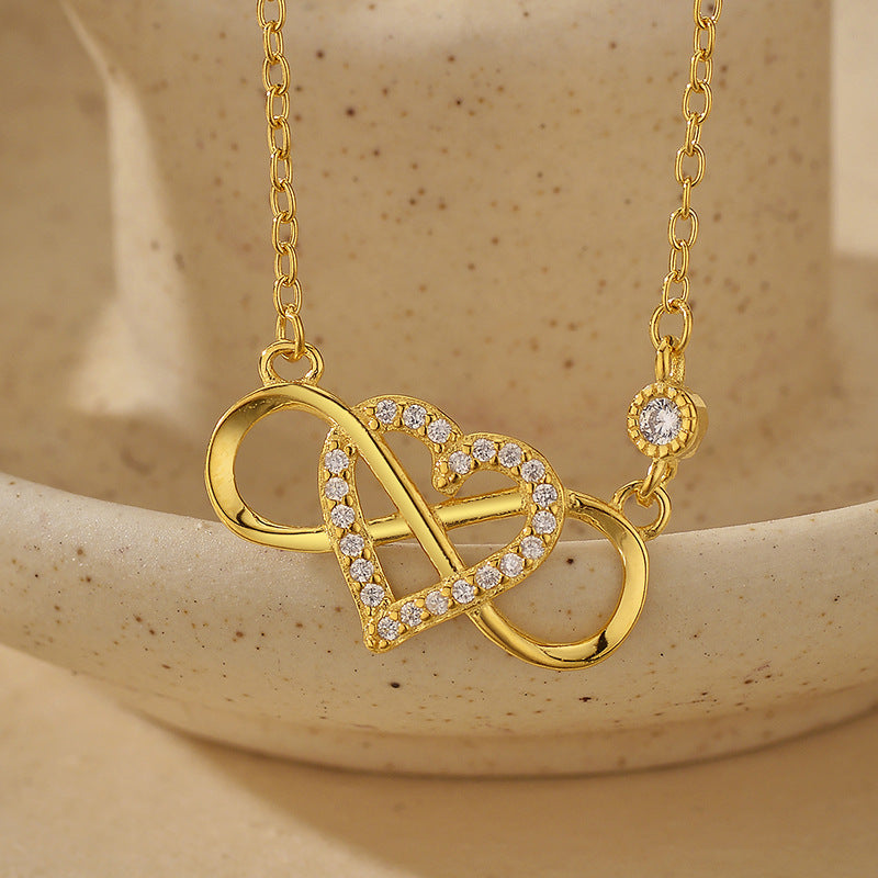 Close-up of Micro Paved Heart Pendant and Polished Silver Chain