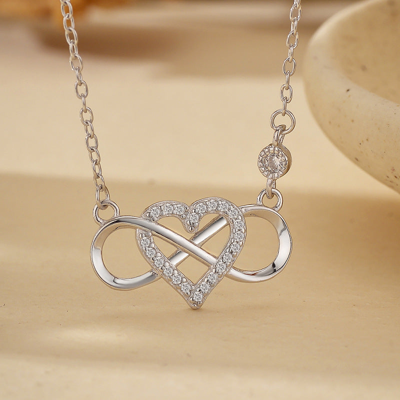 S925 Sterling Silver Heart Pendant Necklace with Micro CZ on White Background