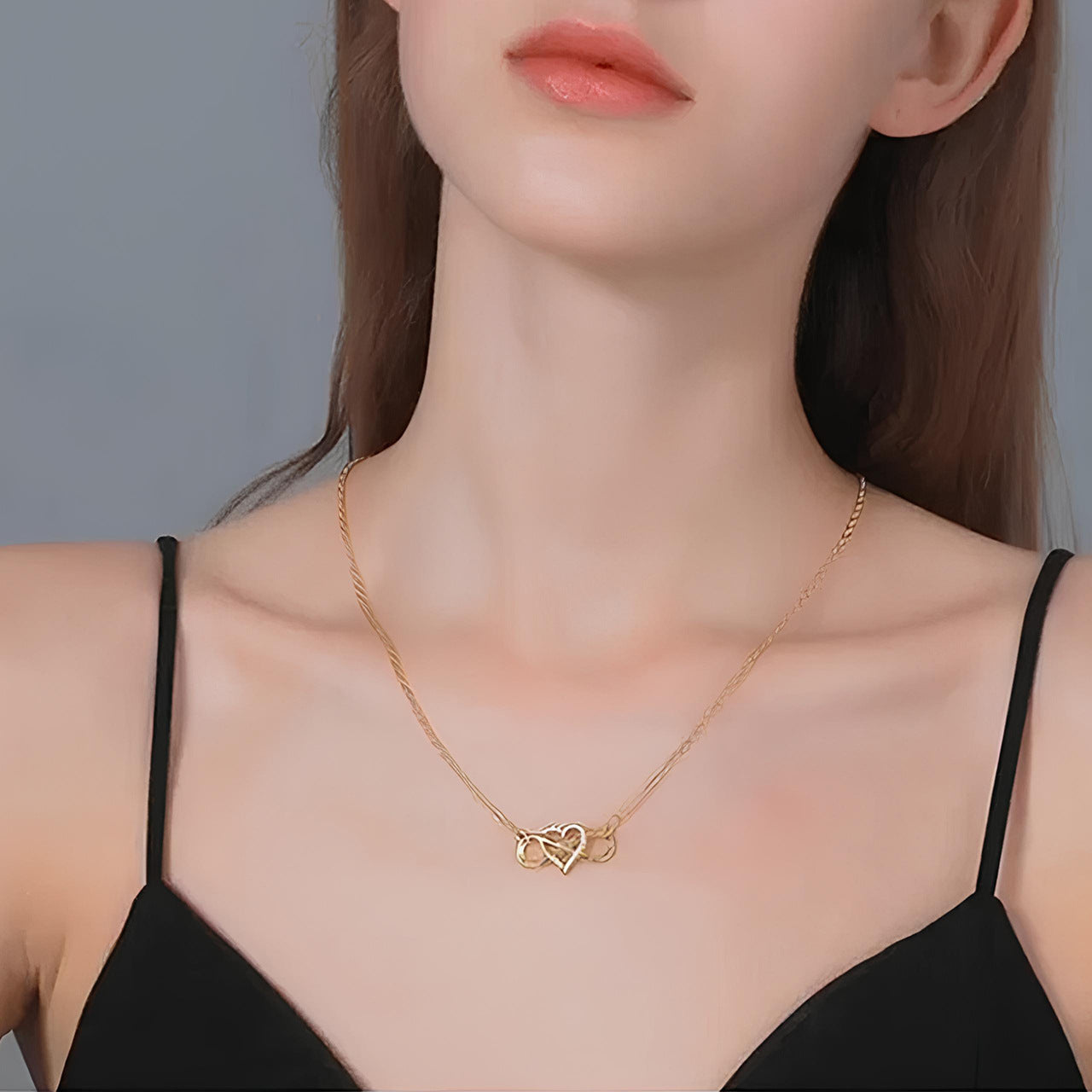 Woman Wearing Minimalist Heart Necklace on Collarbone