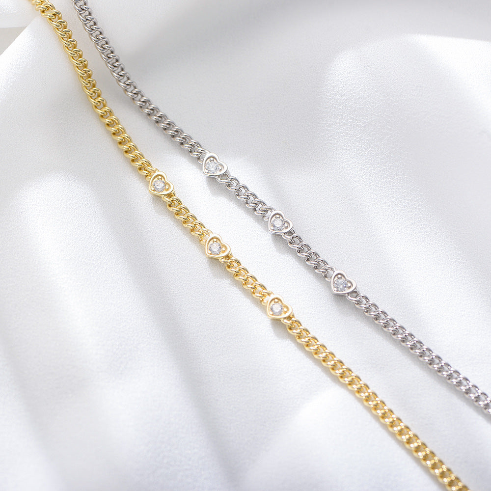 Close-up of Heart Zircon Charm and Silver Chain