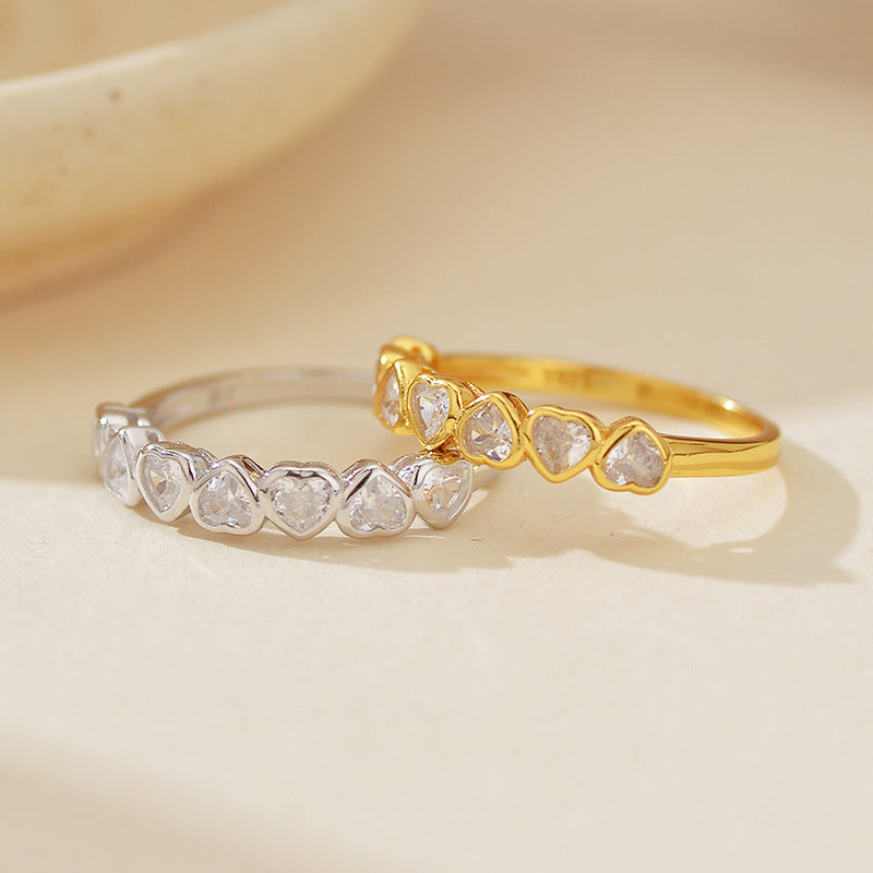 Close-up of Heart Shape and Pave Zircon Details on Silver Ring