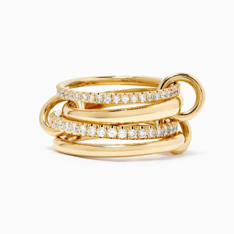 “Flat lay of S925 sterling silver four-band interlocking micro-paved ring for women”