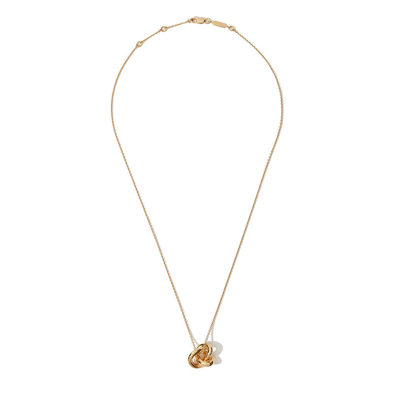 “Flat lay of S925 sterling silver interlocking rings necklace on white background”