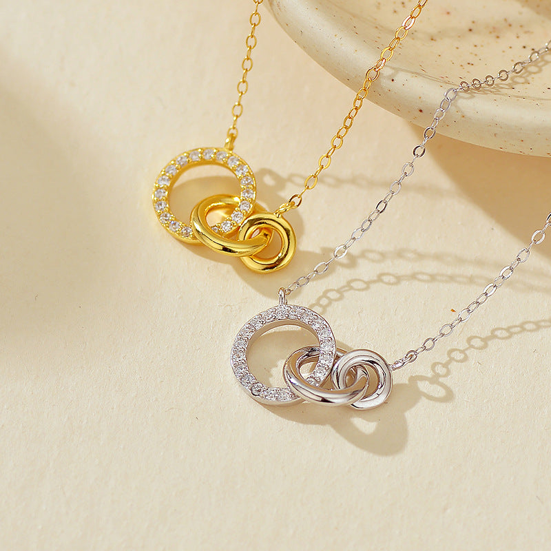 Close-up of Interlocking Rings Pendant with Cubic Zirconia Stones