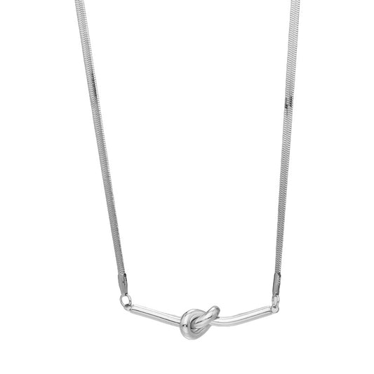 “Flat lay of S925 sterling silver knotted snake bone chain necklace”